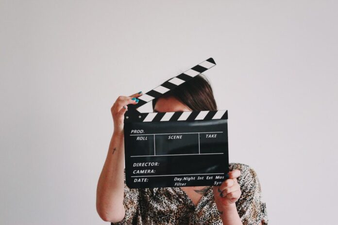 Stock film bioscoop Photo by Jon Tyson on Unsplash